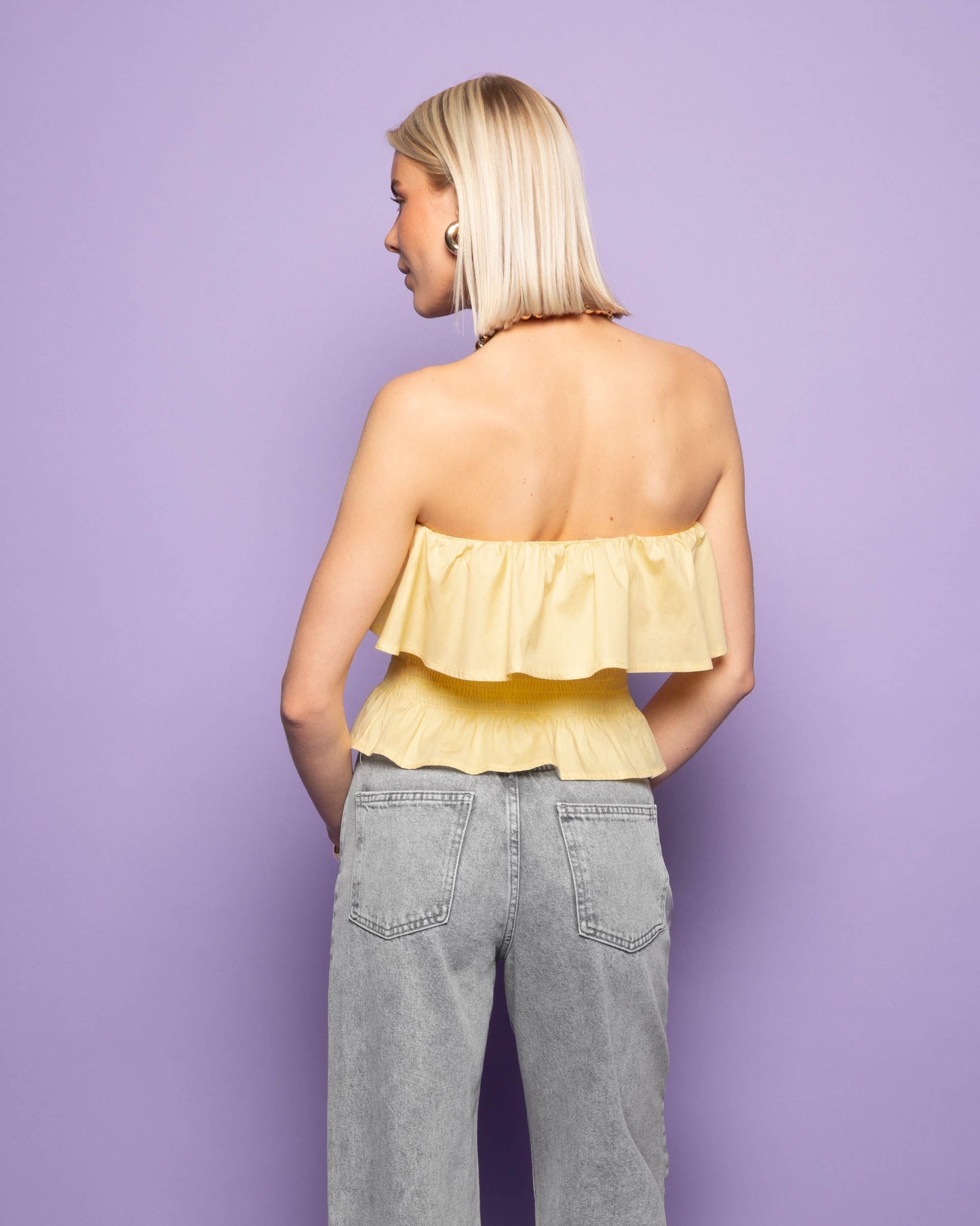 STRAPLESS RUFFLE SMOCK TOP BOTERGEEL