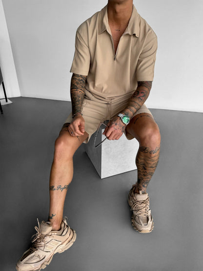 Oversize-Poloshirt mit Reißverschluss und mehreren Lagenmuster - Beige