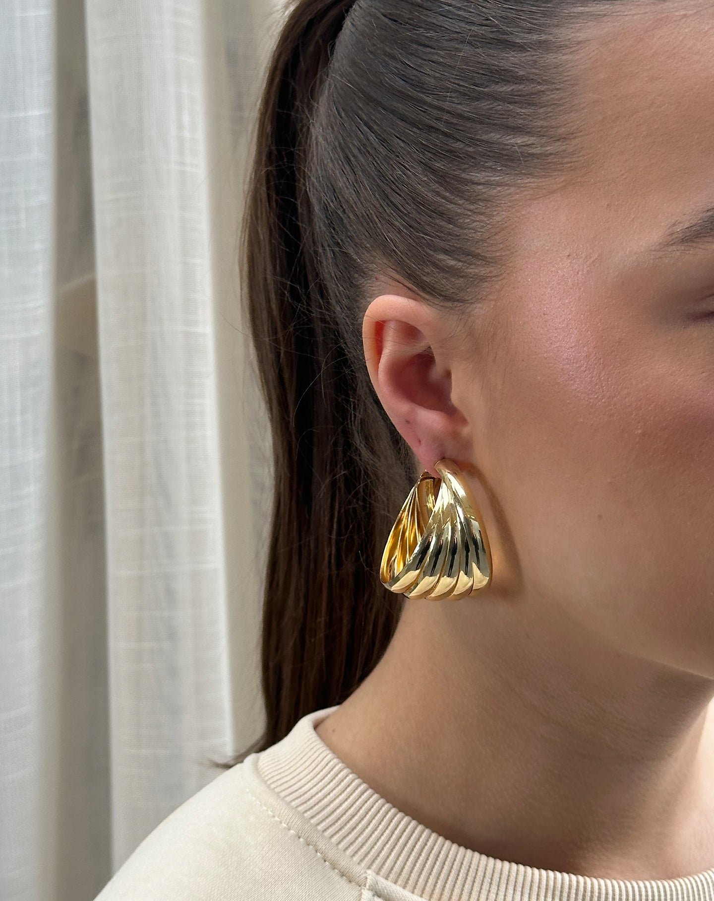 BIG TWISTED HOOP EARRINGS